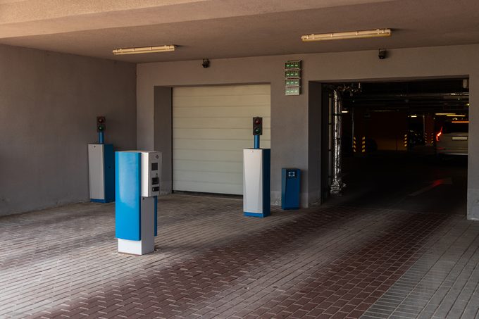 A commercial overhead door at a parking structure entrance